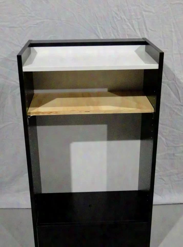 Lectern with interchangeable front panel and LED lighting