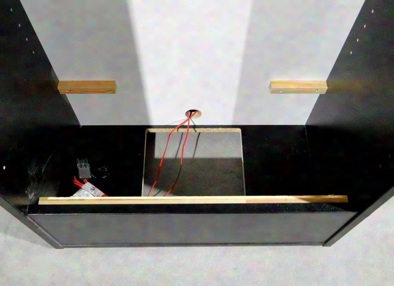 Lectern with interchangeable front panel and LED lighting