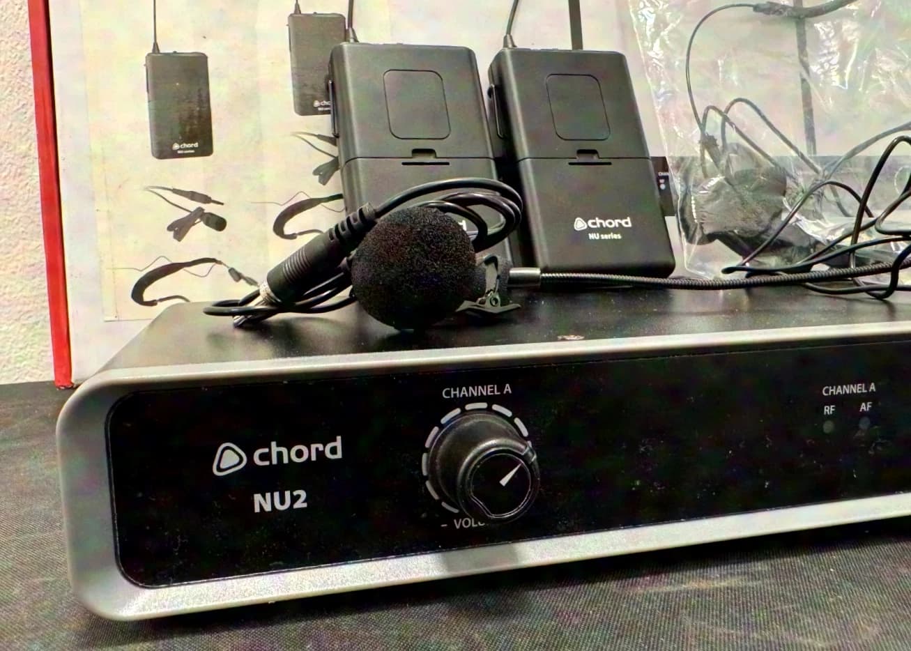 chord NU2 two-way UHF wireless microphone system with two bodypack transmitters, 2 headsets and 2 lavalier microphones
